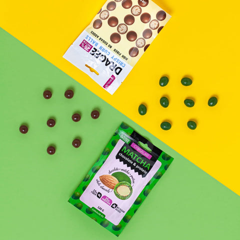 Chocolate covered almonds with green matcha tea