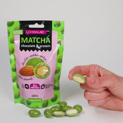 Chocolate covered almonds with green matcha tea